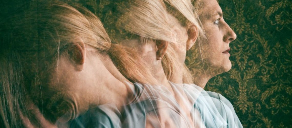 A multi-exposure image of a depressed woman.